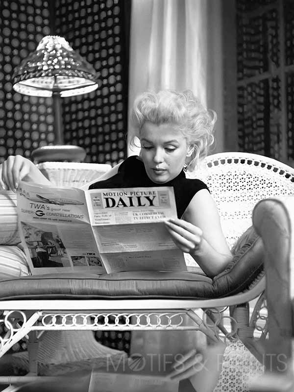 Monroe Reading Newspaper